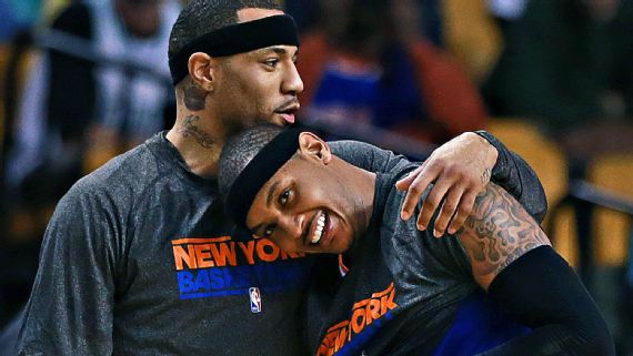 Kenyon Martin, left, shown here during his time with the Knicks in 2013, and Carmelo Anthony were among the players criticized by former NBA coach George Karl in his new book, "Furious George." Jim Davis/The Boston Globe/Getty Images